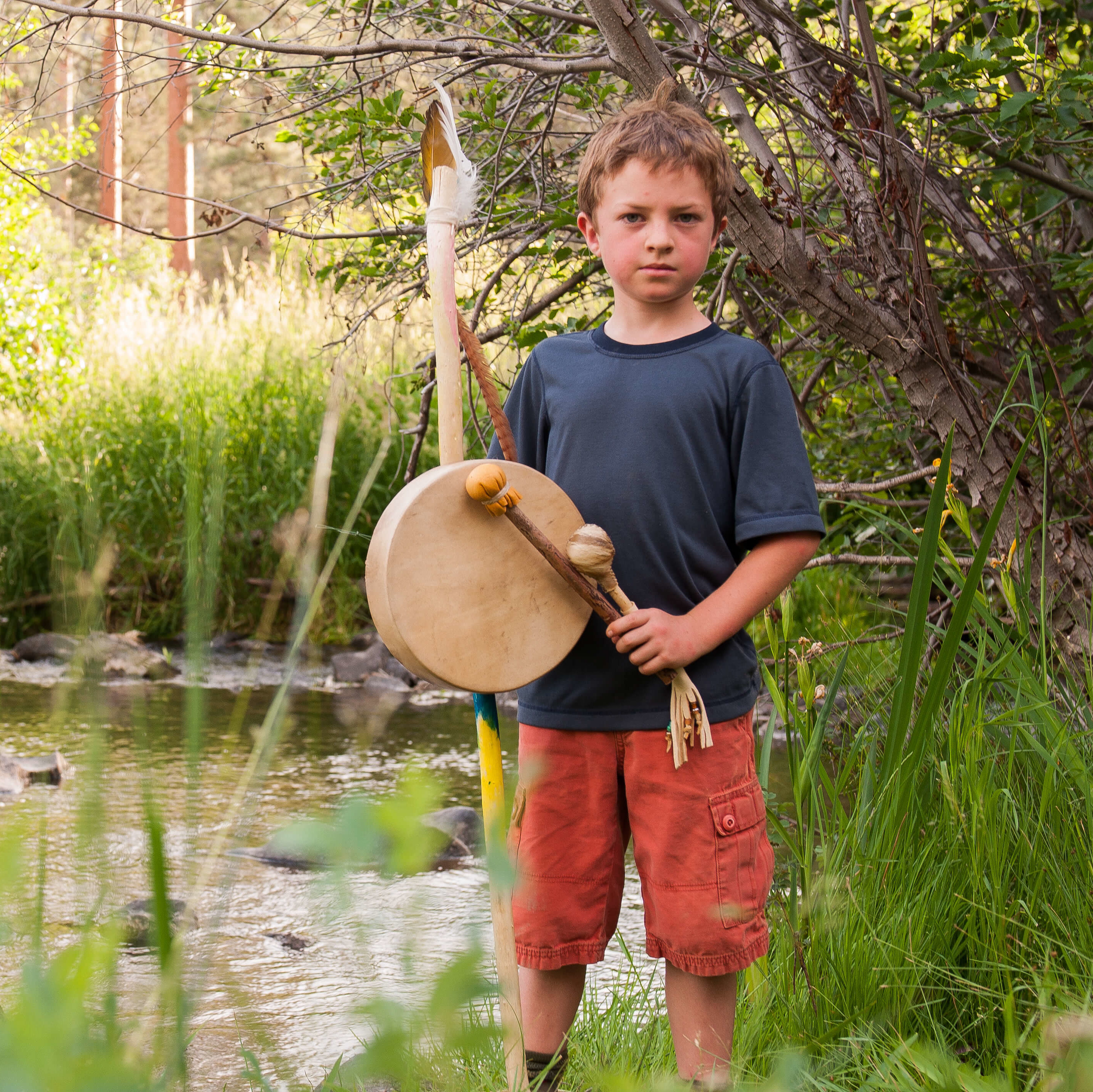 Boy with drum and wizard staff